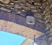 Sirene alarme ajax installée par QR ENERGIES sur une maison en pierre à Marsanne